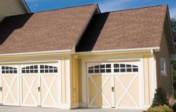 Residential triple garage with new doors.