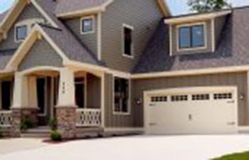 A residential house with a double garage.