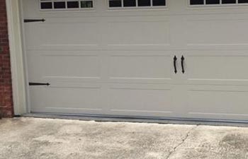 White double garage door with windows