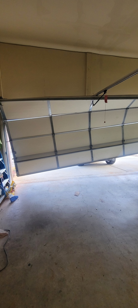 Garage Door Off Track Hoschton, GA