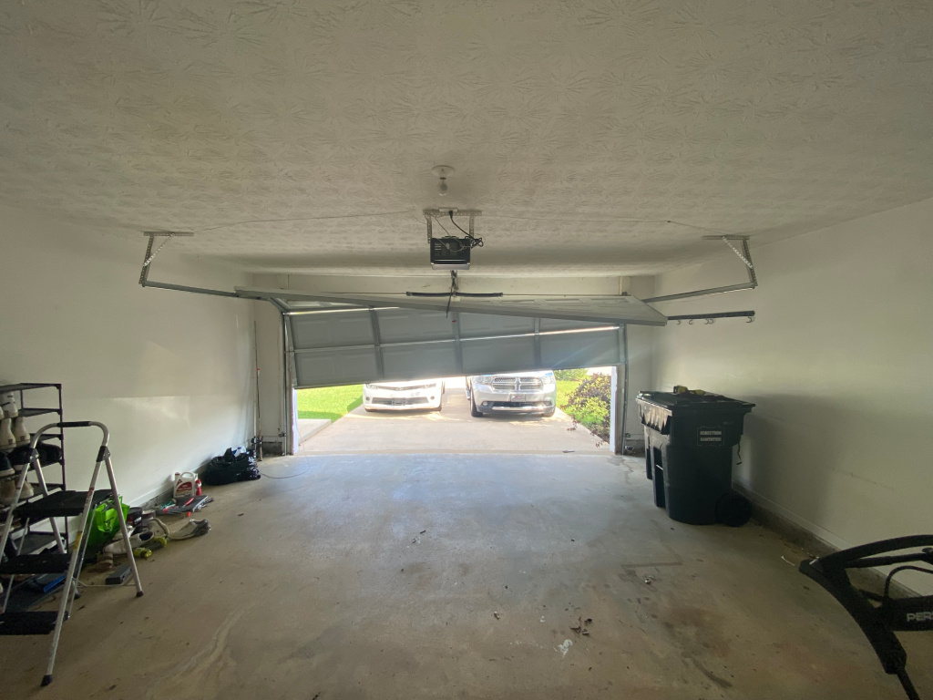 Garage Door Off Track Snellville, GA