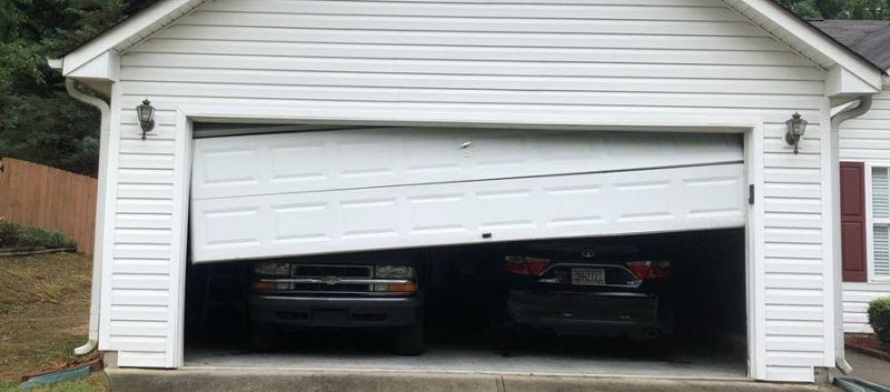 garage door off-track repair | Roswell, GA