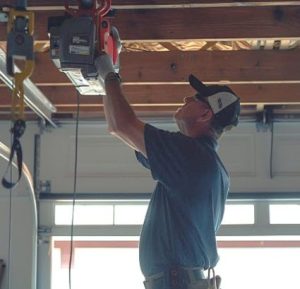 Specialist installing LiftMaster opener in Woodstock Ga